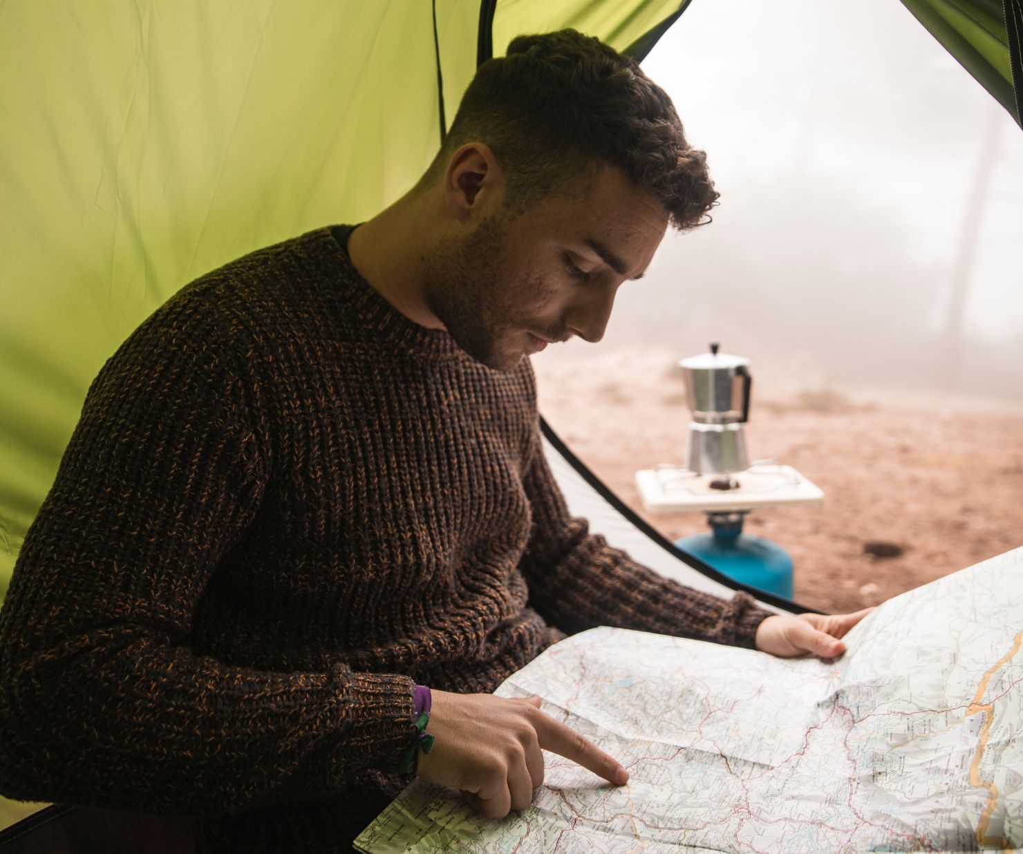 Campers reviewing maps and planning their trip